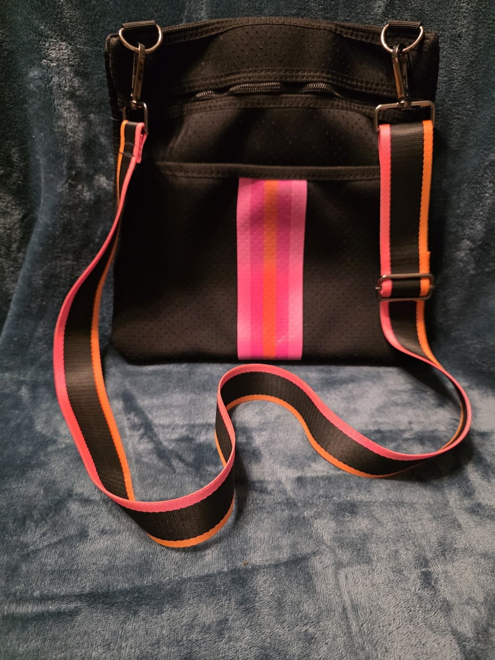 HAUTE SHORE Black Crossbody with Pink & Orange Stripe Strap